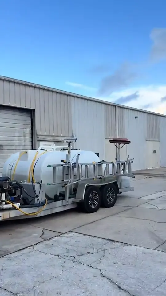 Washing a metal commercial building, a paver walkway and the parking lot.
