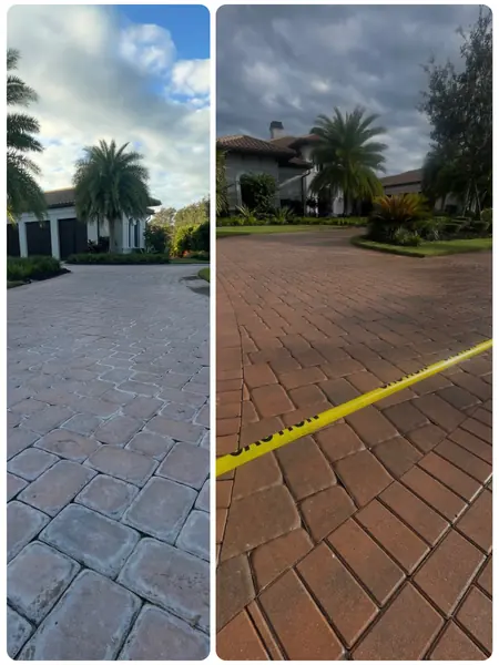 Side by side of a paver driveway at an estate: dull gray hazy pavers on the left, clean red-brown pavers on the right